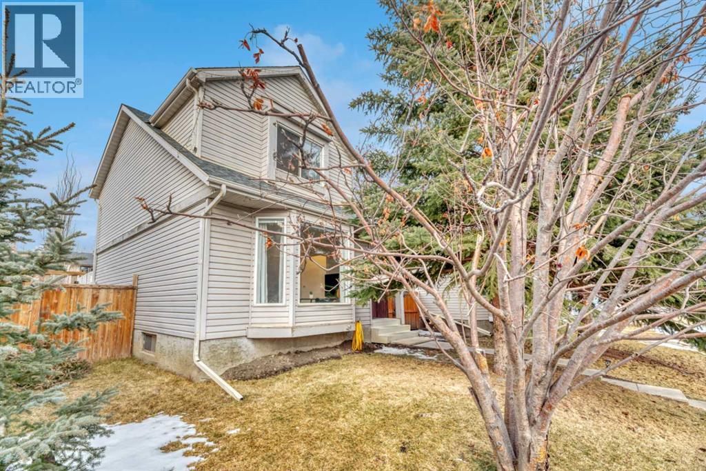 56 Woodglen Court Sw, Calgary, Alberta  T2W 4K3 - Photo 2 - A2286720