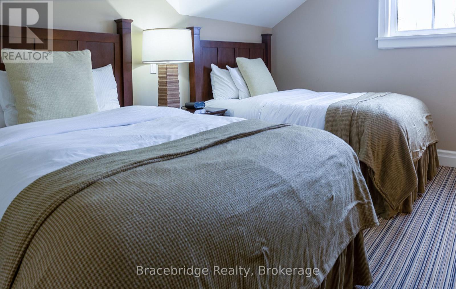 G104-D2 - 1869 Muskoka Road 118 Highway W, Muskoka Lakes (Monck (Muskoka Lakes)), Ontario  P1L 1W8 - Photo 27 - X12857606