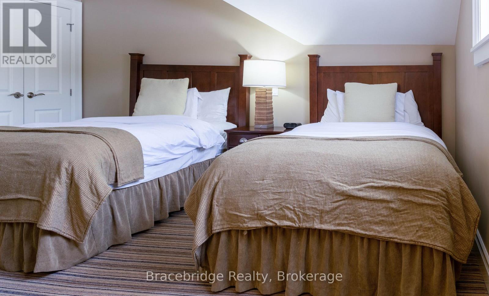 G104-D2 - 1869 Muskoka Road 118 Highway W, Muskoka Lakes (Monck (Muskoka Lakes)), Ontario  P1L 1W8 - Photo 28 - X12857606