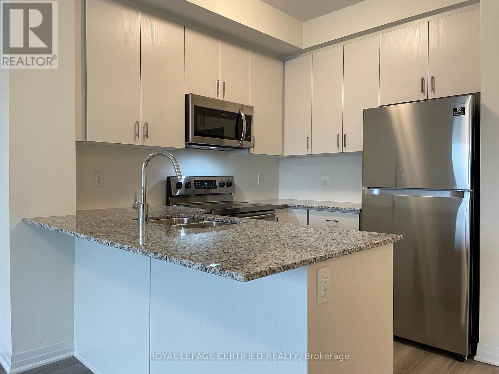 302 - 128 Grovewood Common, Oakville (Go Glenorchy), Ontario  L6H 0X3 - Photo 6 - W12857594