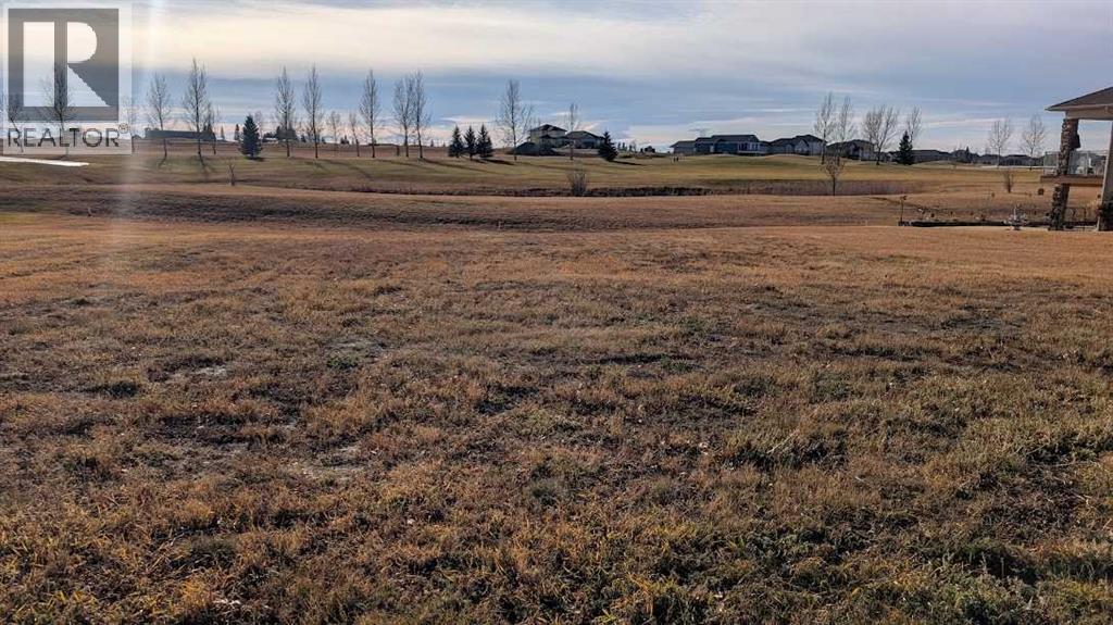 517 Whispering Greens Avenue, Vulcan, Alberta  T0L 0B0 - Photo 1 - A2269228