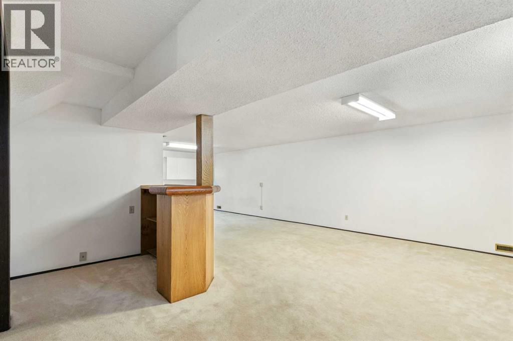 248 Huntcroft Road Ne, Calgary, Alberta  T2K 4E2 - Photo 16 - A2284788