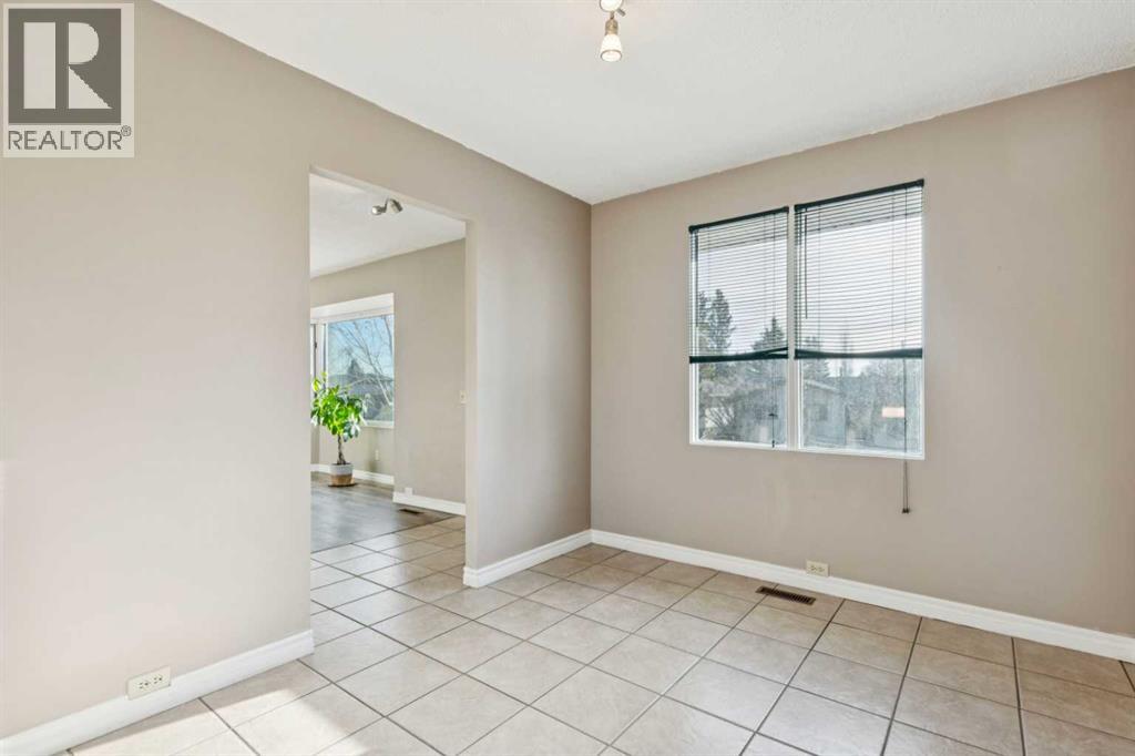 248 Huntcroft Road Ne, Calgary, Alberta  T2K 4E2 - Photo 10 - A2284788