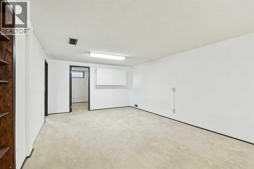 248 Huntcroft Road Ne, Calgary, Alberta  T2K 4E2 - Photo 17 - A2284788