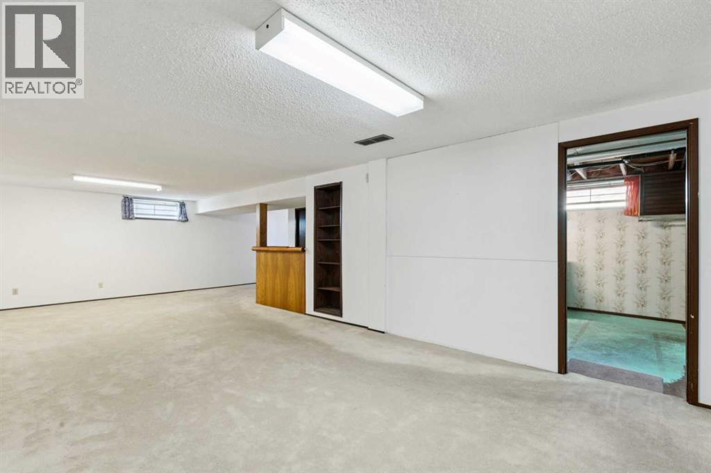 248 Huntcroft Road Ne, Calgary, Alberta  T2K 4E2 - Photo 22 - A2284788