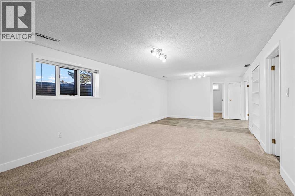 1007 Hunterston Place Nw, Calgary, Alberta  T2K 4N5 - Photo 26 - A2287224