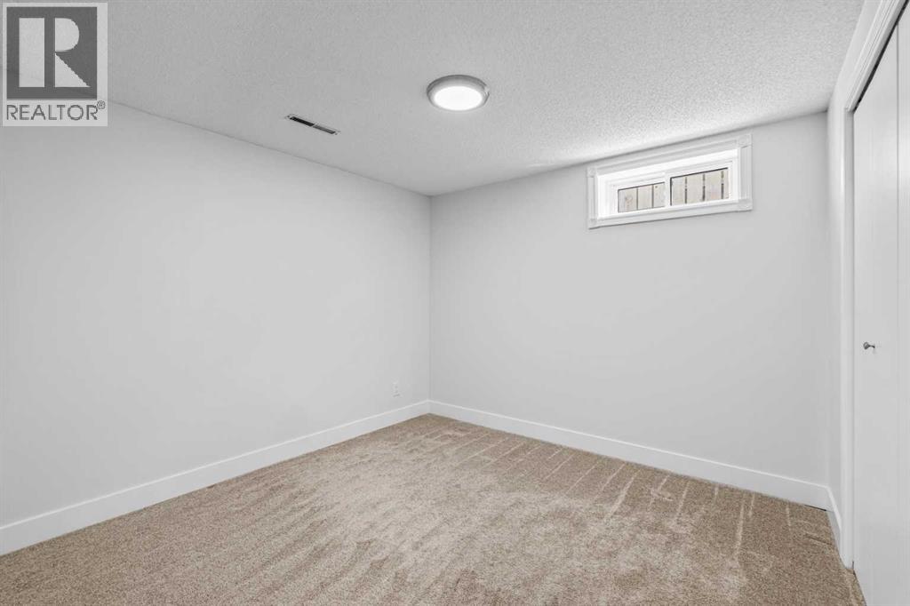 1007 Hunterston Place Nw, Calgary, Alberta  T2K 4N5 - Photo 34 - A2287224