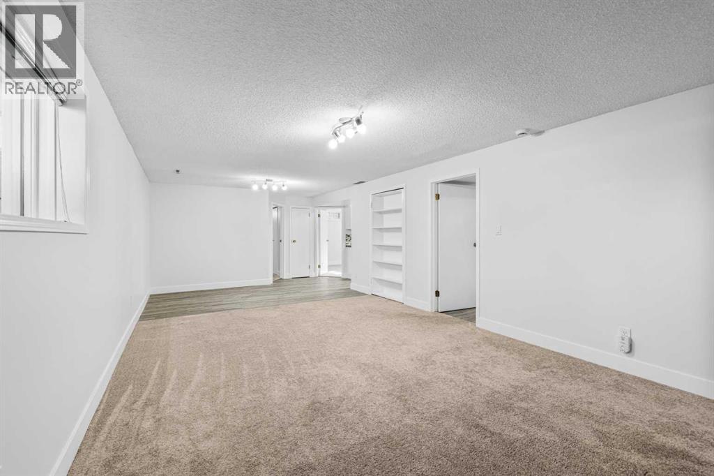 1007 Hunterston Place Nw, Calgary, Alberta  T2K 4N5 - Photo 27 - A2287224