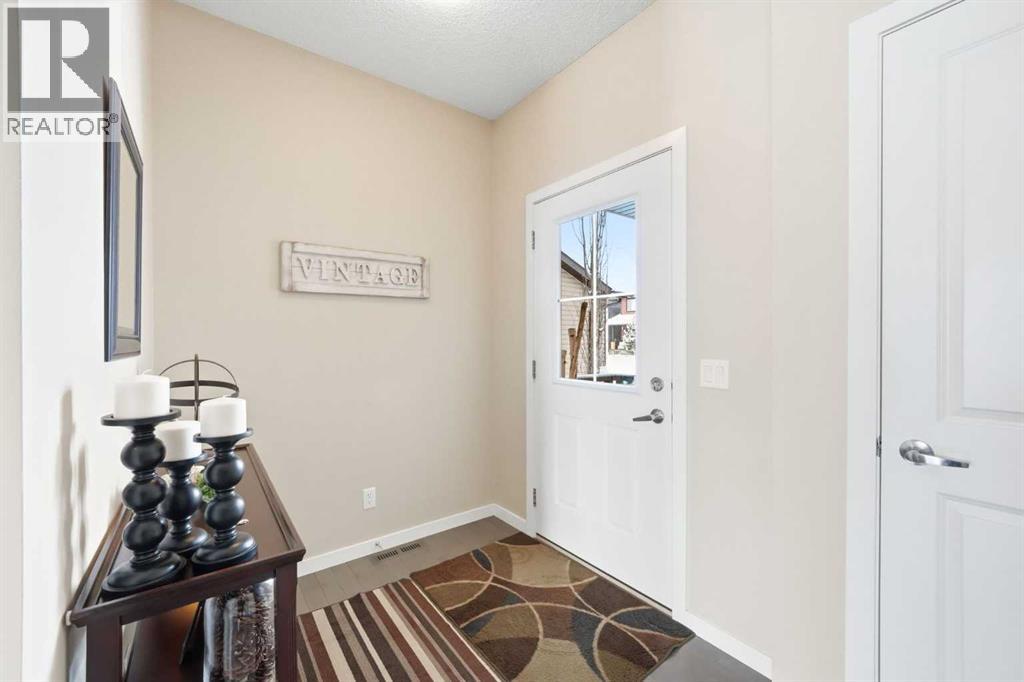 125 Fireside Cove, Cochrane, Alberta  T4C 0X4 - Photo 4 - A2288800