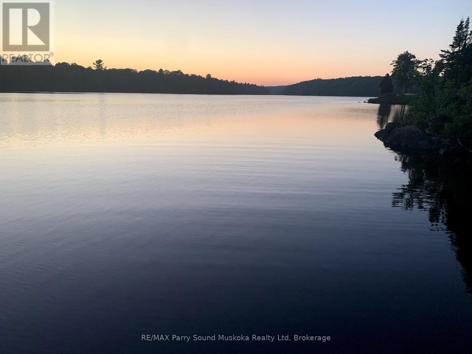 38 Fun Cottage Lane, Mcdougall, Ontario  P2A 2W7 - Photo 2 - X12857882