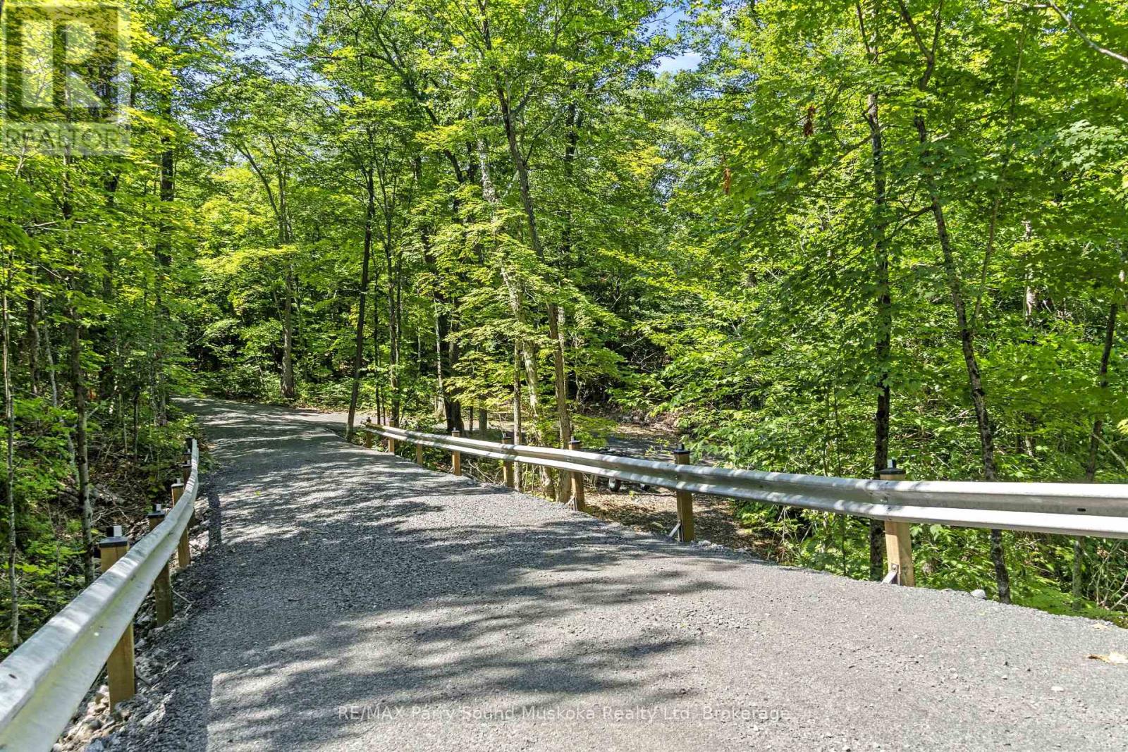 38 Fun Cottage Lane, Mcdougall, Ontario  P2A 2W7 - Photo 7 - X12857882