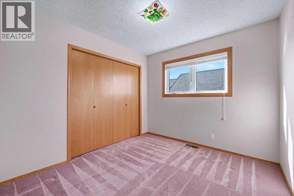 82 Wood Valley Drive Sw, Calgary, Alberta  T2W 5V6 - Photo 24 - A2290576