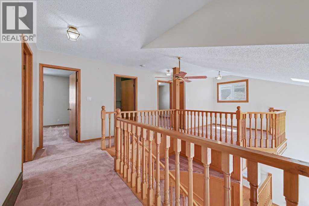 82 Wood Valley Drive Sw, Calgary, Alberta  T2W 5V6 - Photo 26 - A2290576