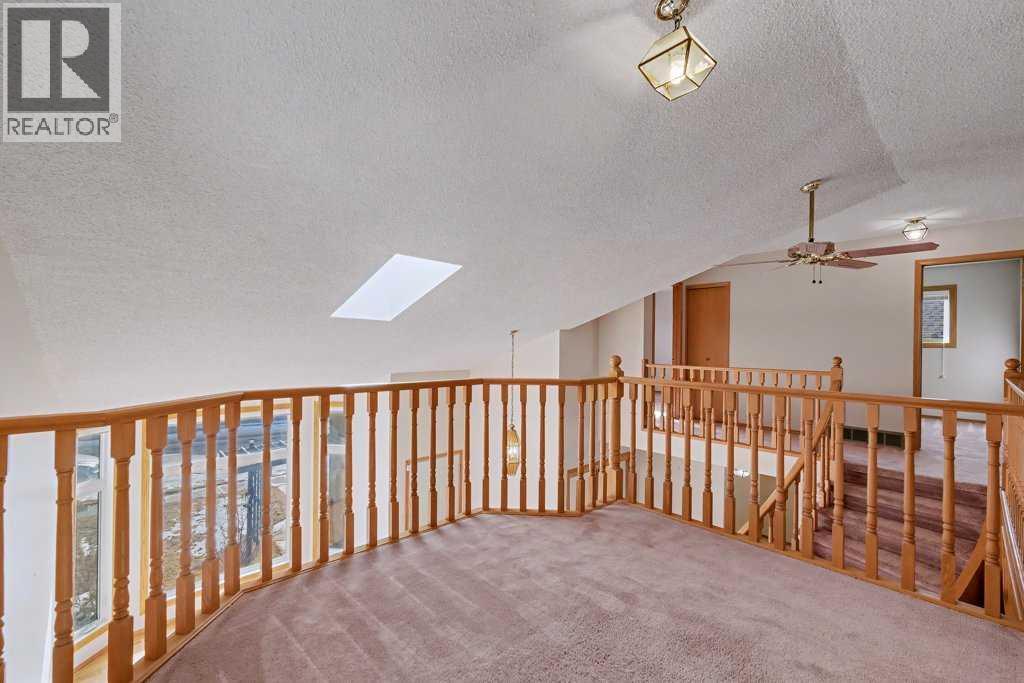 82 Wood Valley Drive Sw, Calgary, Alberta  T2W 5V6 - Photo 34 - A2290576