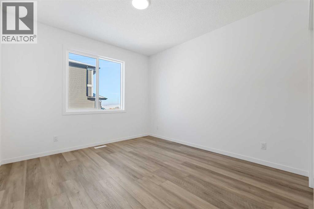 438 Corner Glen Way Ne, Calgary, Alberta T3N 2P1 - Photo 4 - A2273925