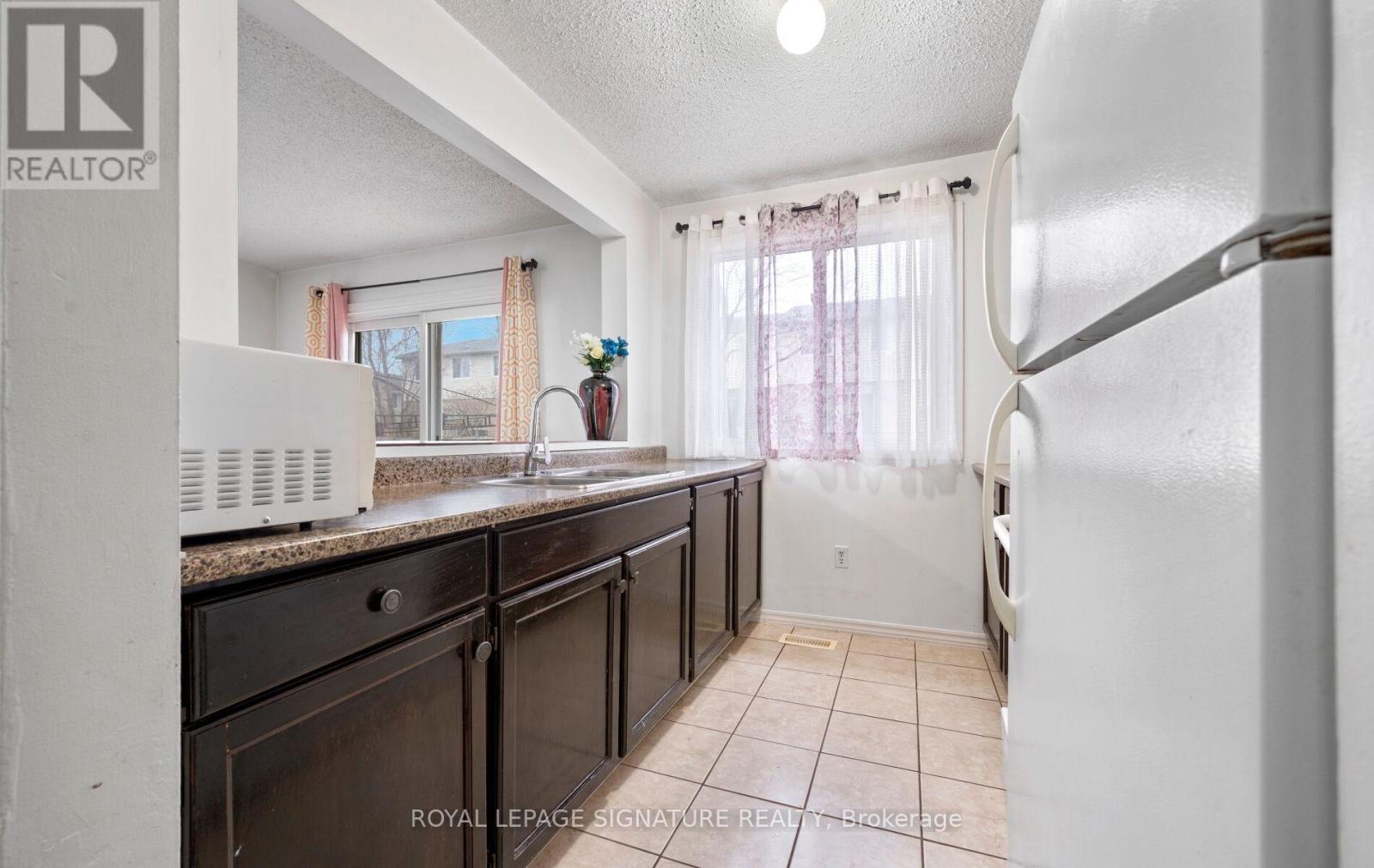 2 - 262 Kenora Avenue, Hamilton, Ontario  L8E 3Y3 - Photo 17 - X12858052