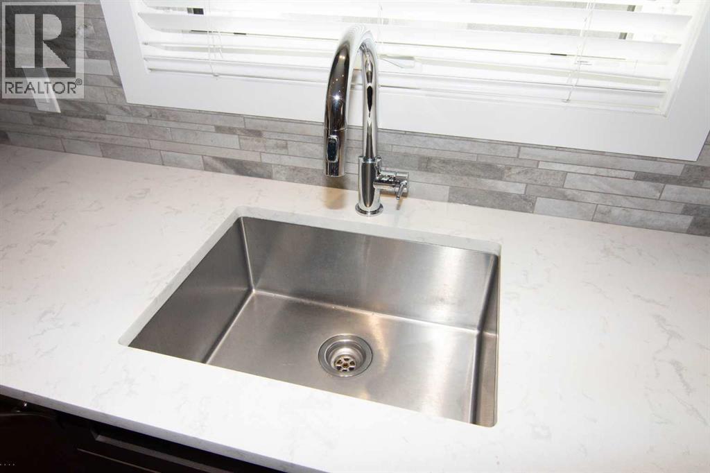 1139 Lake Sylvan Drive Se, Calgary, Alberta  T2J 2P9 - Photo 29 - A2290254