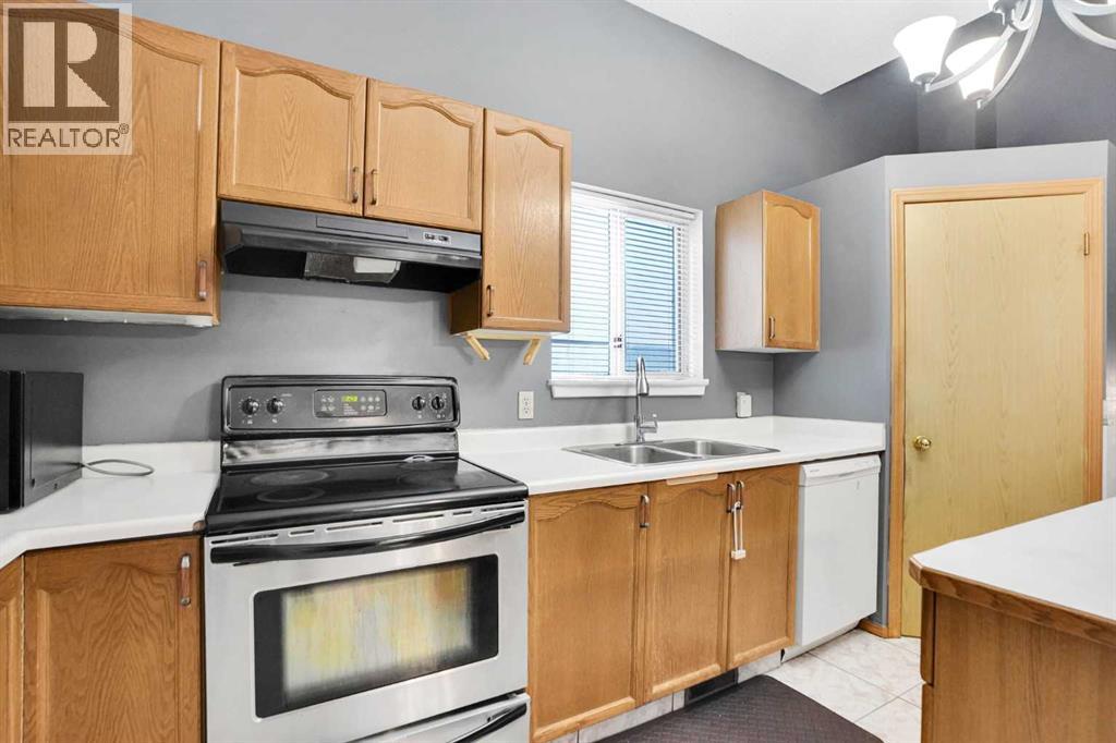 6934 Laguna Way Ne, Calgary, Alberta T1Y 6W2 - Photo 12 - A2277480