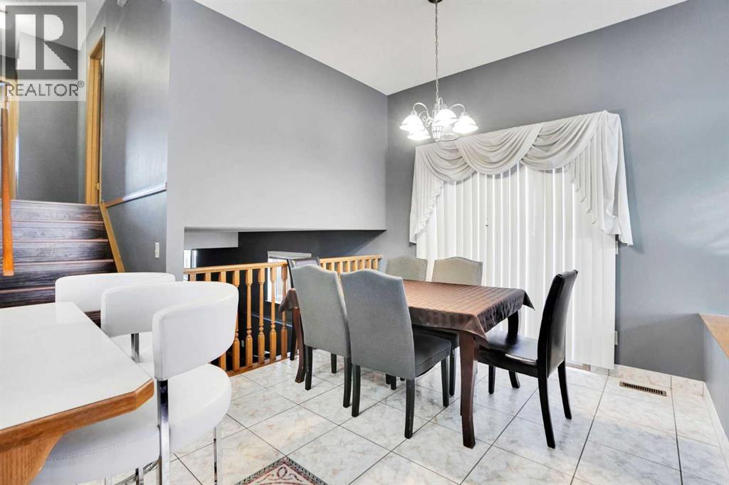 6934 Laguna Way Ne, Calgary, Alberta T1Y 6W2 - Photo 7 - A2277480