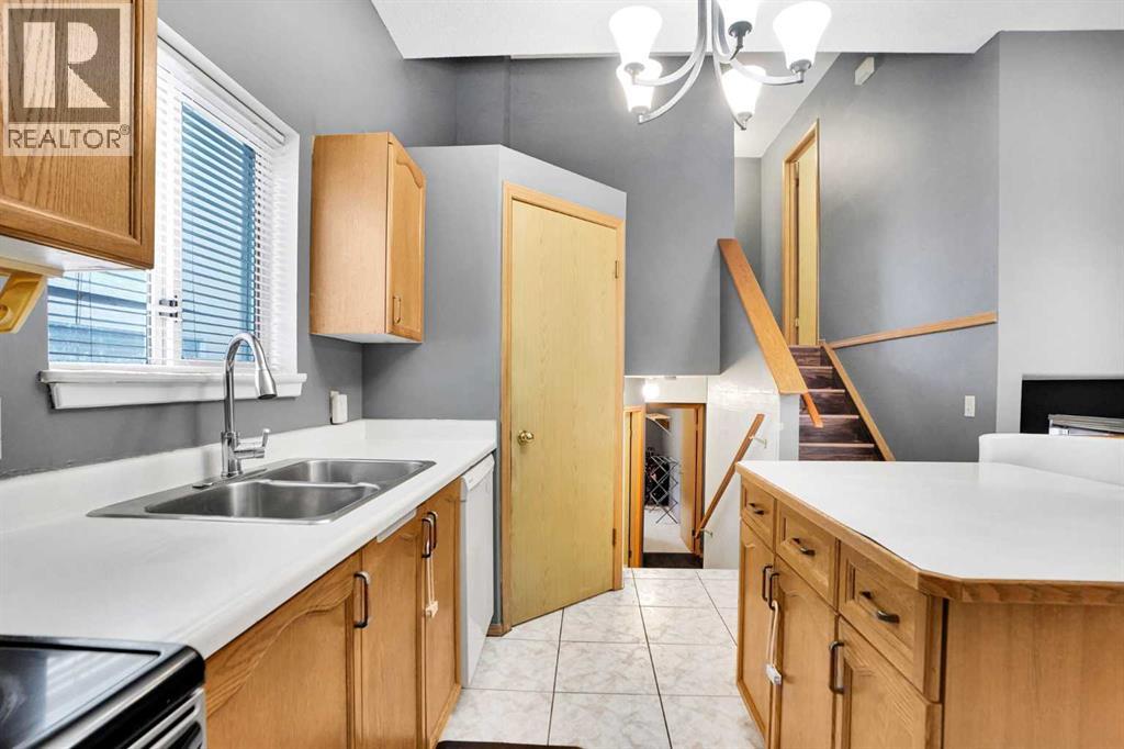 6934 Laguna Way Ne, Calgary, Alberta T1Y 6W2 - Photo 11 - A2277480