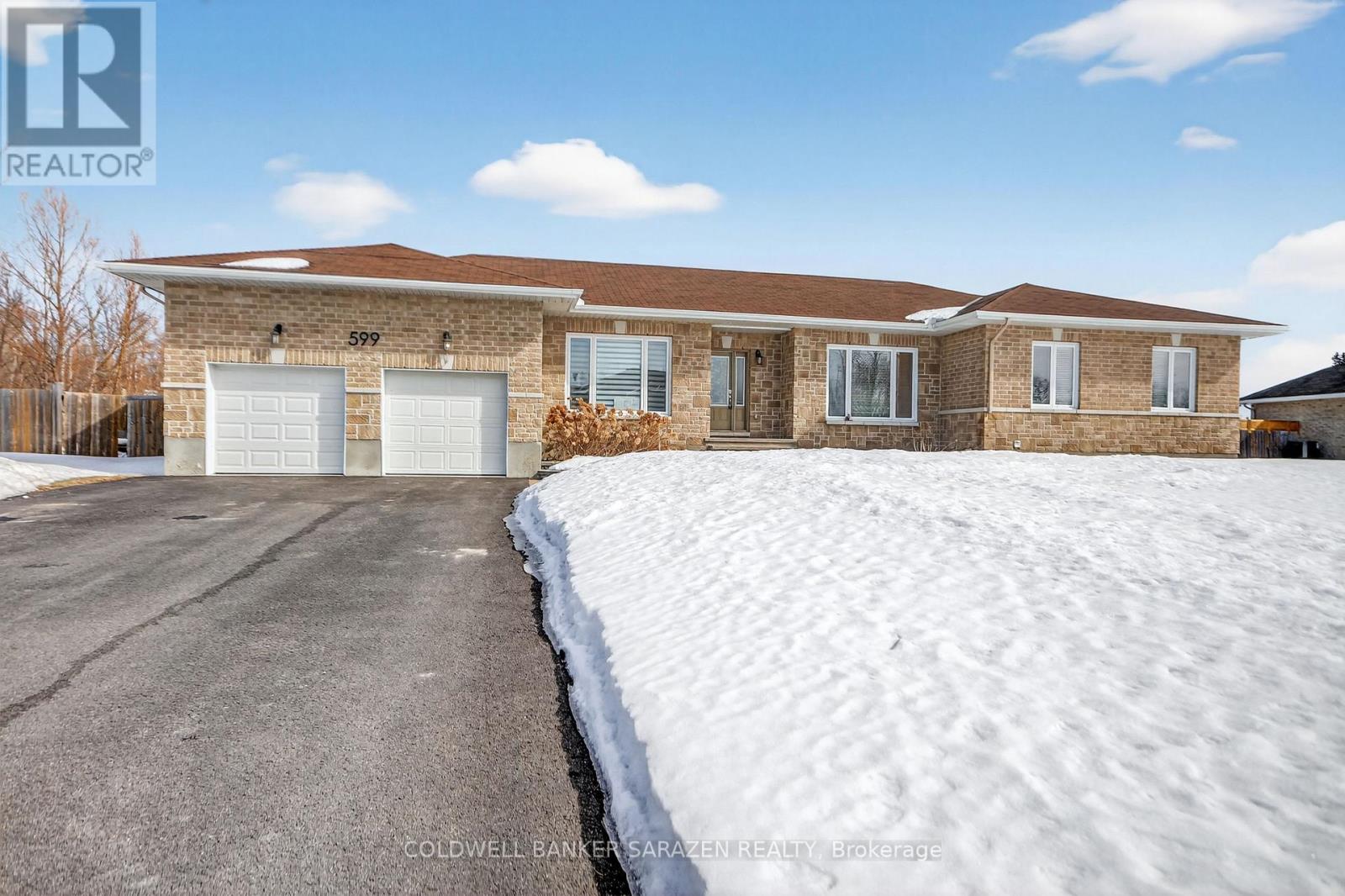 Don't miss this large 4-bedroom bungalow nestled on a ~1/2-acre lot near Emerald Golf Course & Rideau Carleton Raceway and Casino. This tremendous home offers a blank canvas for your large or growing family to plant country roots just outside of the city! Features a spacious center-hall plan with an open foyer and views through to the living room and beyond to the incredible backyard. Hardwood and ceramic flooring throughout; good quality kitchen w/ plenty of cabinets, workspace, and a walk-in pantry; inviting principal suite w/ walk-in closet and spacious 5-pc ensuite bath. Three additional bedrooms, the main-floor laundry, a full family bath, and a convenient powder bath. There is a lovely staircase to the lower level, offering unfinished space & a full bathroom rough-in that you can finish to maximize your lifestyle. Enormous, fully fenced backyard w/ plenty of space for all ages. The large two-car garage offers inside entry to the mudroom and powder bath, and outdoor access to the side yard. Minutes to Findlay Creek and Albion Rd, and a short drive to surrounding communities for all needs and wants. (id:48254)