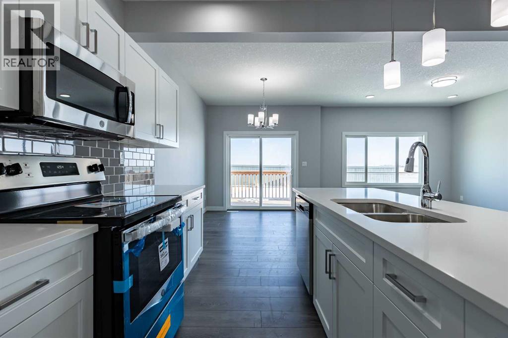 7 Heritage Point, Cochrane, Alberta  T4C 3K7 - Photo 11 - A2291321