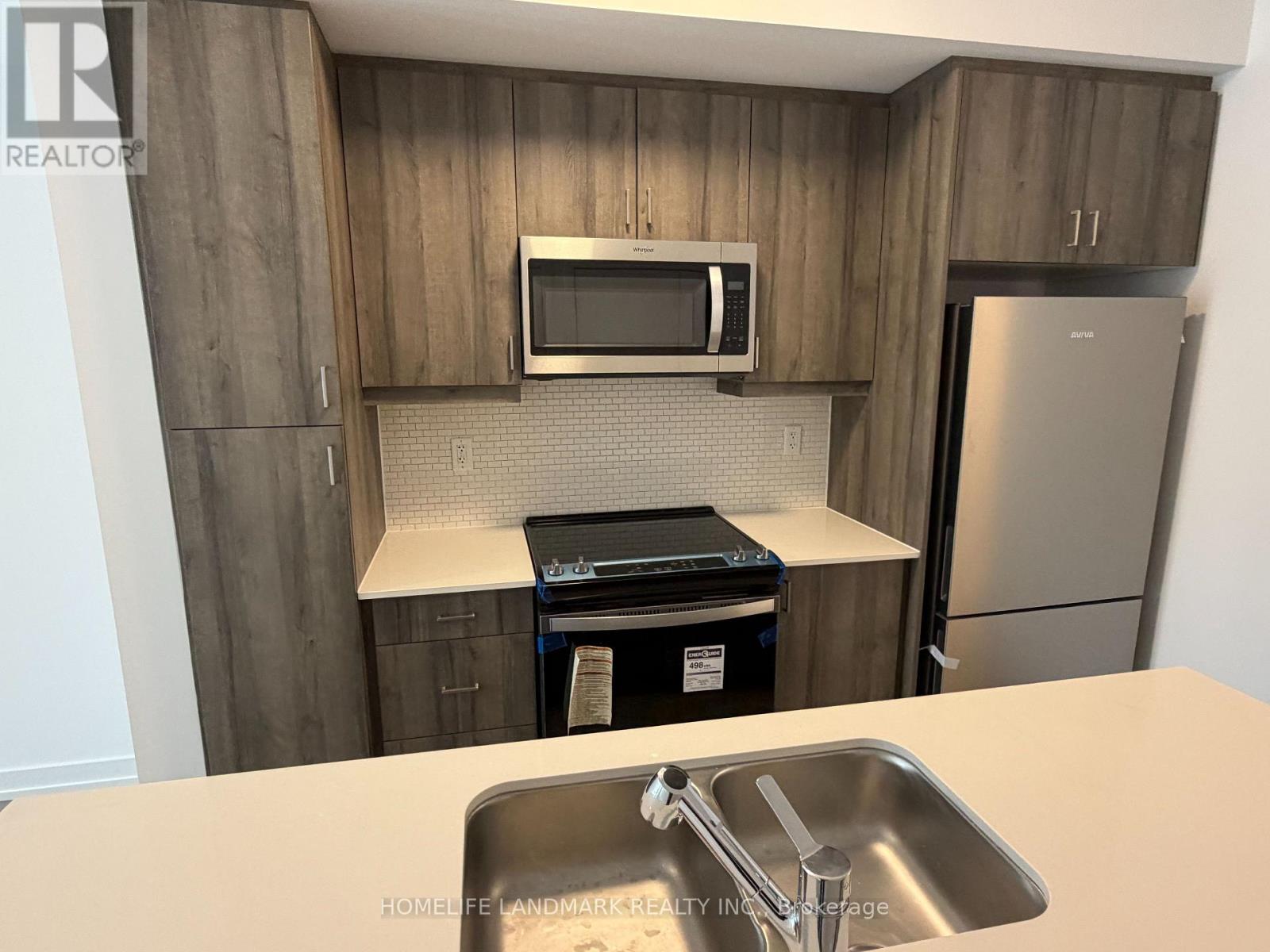 107 - 51 Jefferson Side Road, Richmond Hill, Ontario  L4E 1M1 - Photo 2 - N12856362