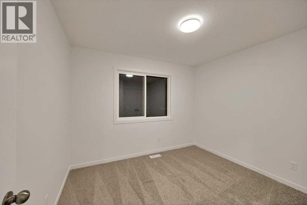 561 Chelsea Gardens, Chestermere, Alberta  T1X 2V4 - Photo 37 - A2280508