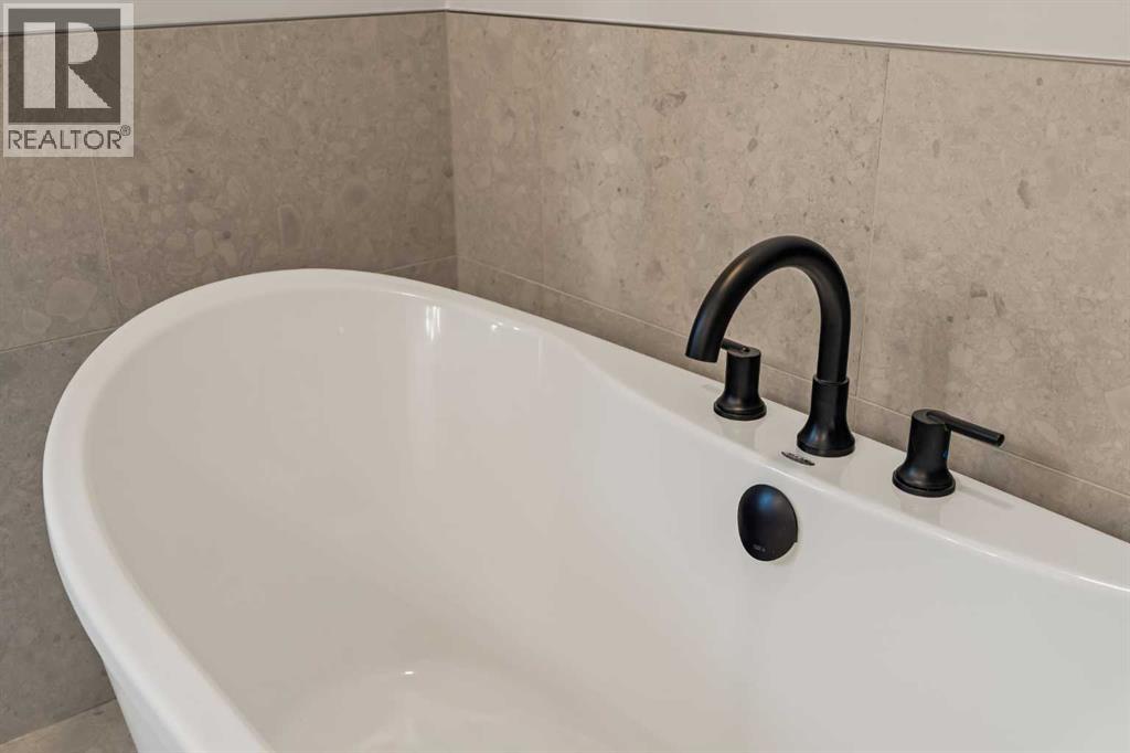 219 Silver Spruce Grove Sw, Calgary, Alberta  T2X 5M2 - Photo 32 - A2283857