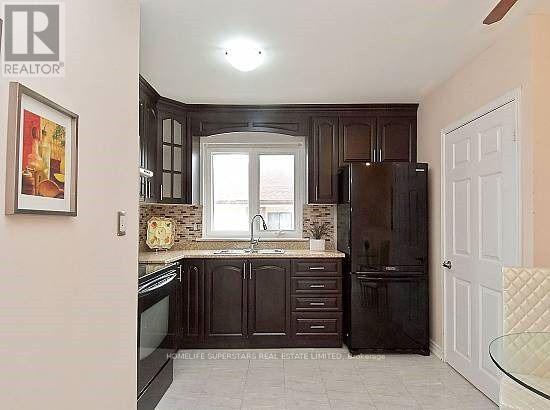 14 Dorward Drive, Toronto (Mount Olive-Silverstone-Jamestown), Ontario  M9V 2J5 - Photo 8 - W12858650