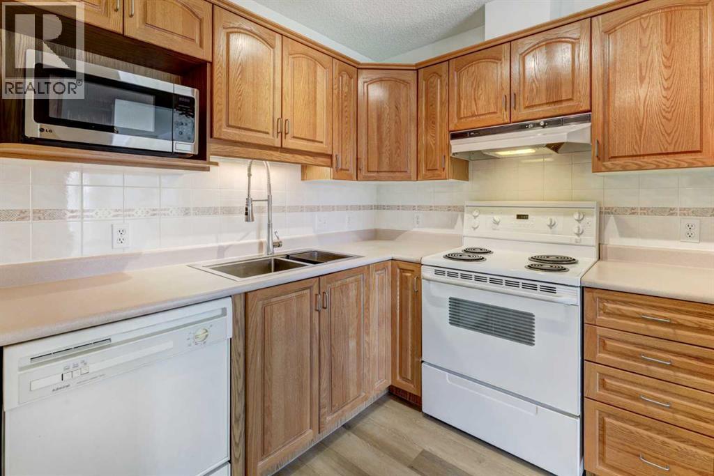 309, 3309 Hawksbrow Point Nw, Calgary, Alberta T3G 4C9 - Photo 7 - A2286826