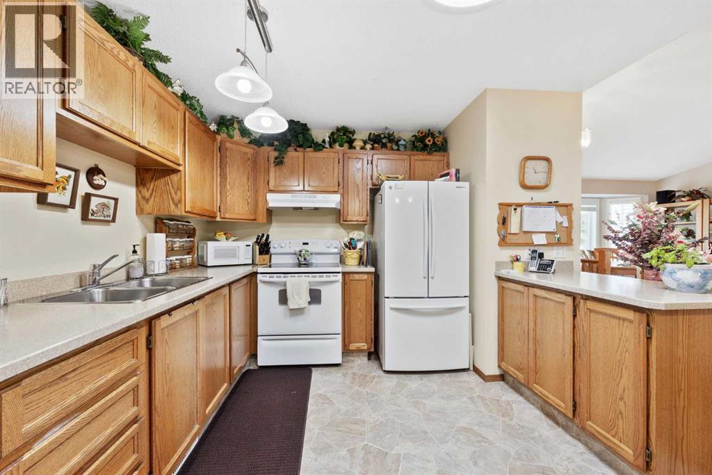 217 Arbour Cliff Close Nw, Calgary, Alberta  T3G 3W7 - Photo 13 - A2244003