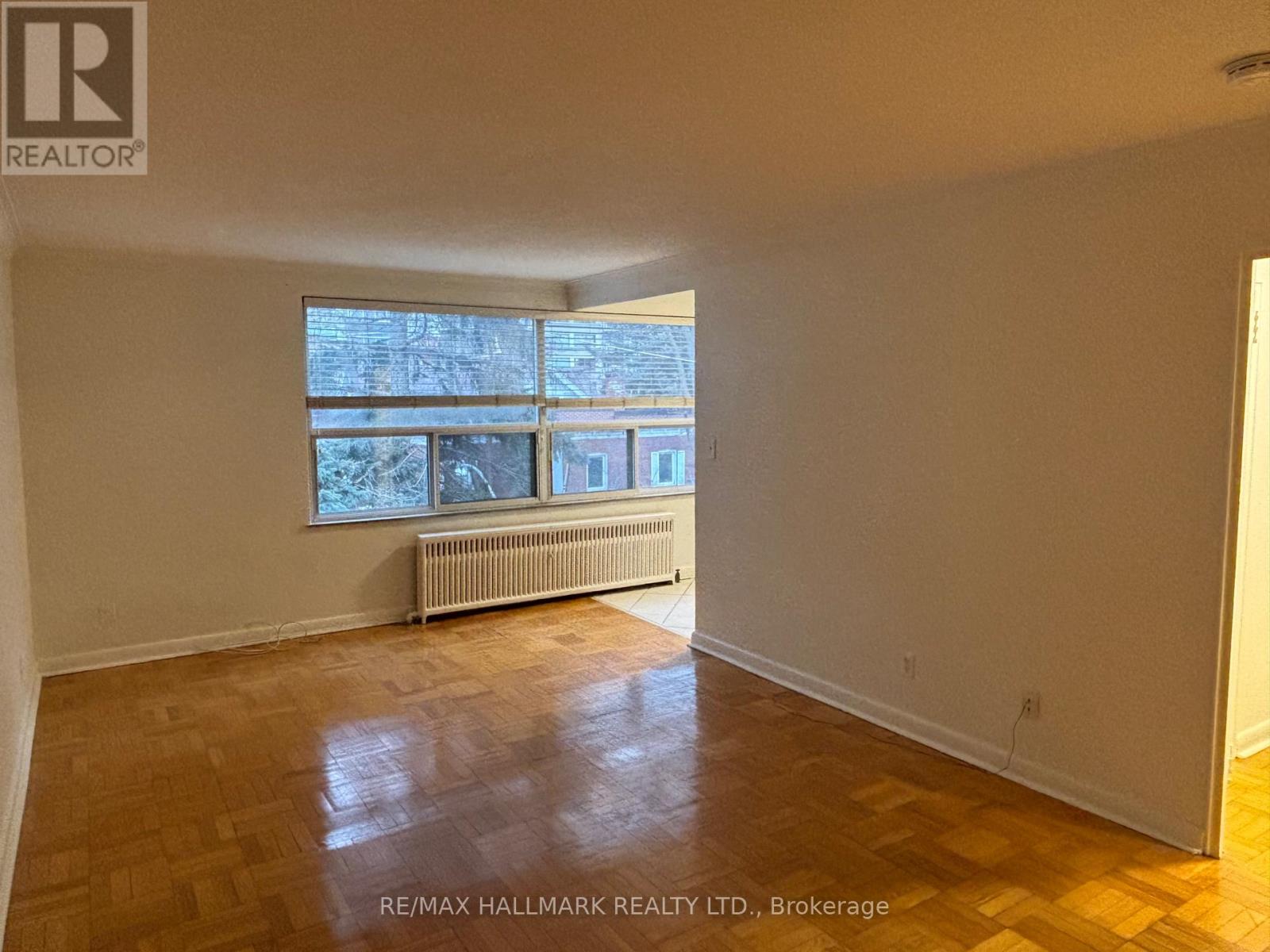 407 - 134 Lawton Boulevard, Toronto, Ontario  M4V 2A4 - Photo 2 - C12857574