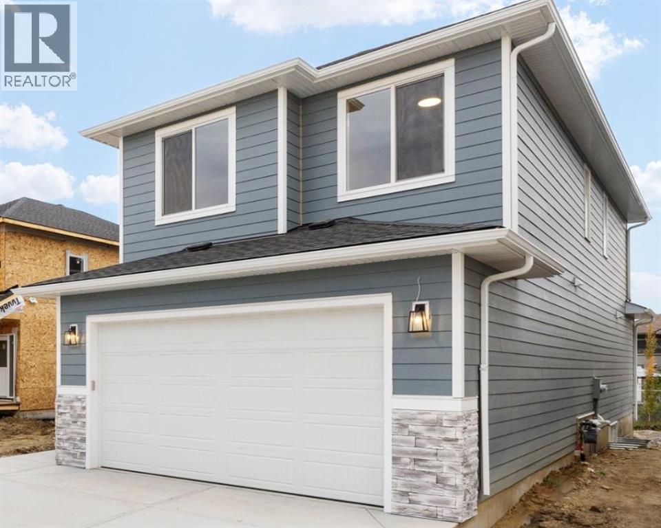 702 Mandalay Link, Carstairs, Alberta  T0M 0N0 - Photo 1 - A2291710