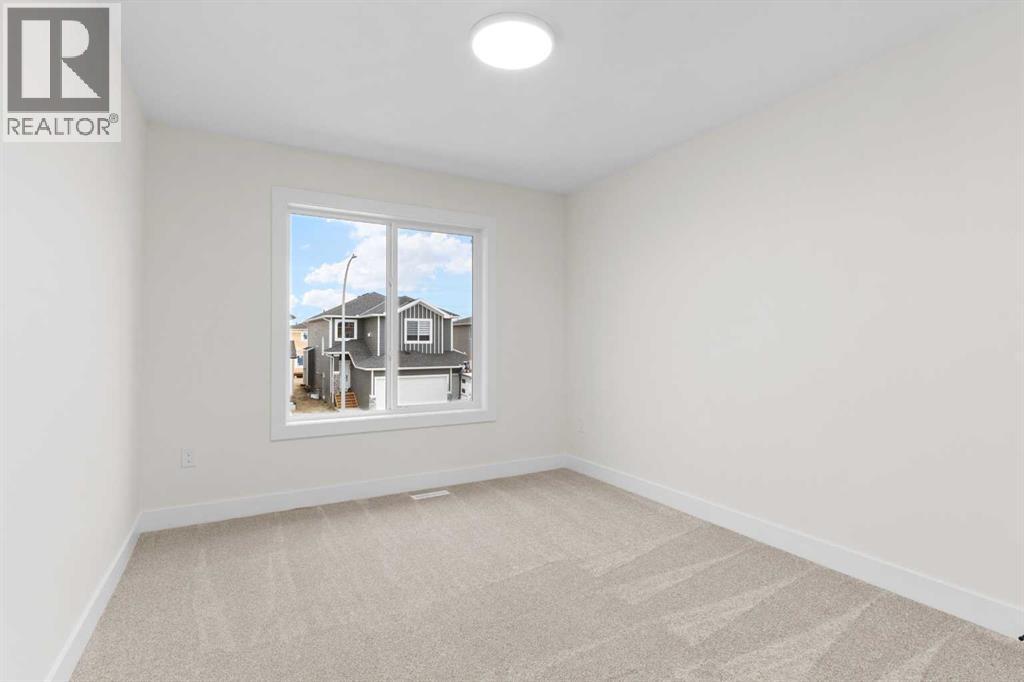 702 Mandalay Link, Carstairs, Alberta  T0M 0N0 - Photo 9 - A2291710
