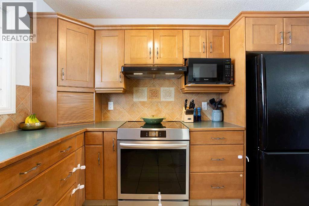 1012 Hunterston Hill Nw, Calgary, Alberta  T2K 4N8 - Photo 13 - A2290631