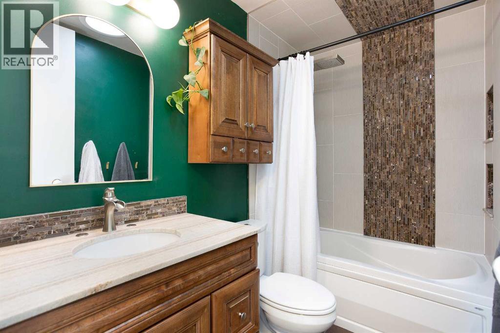 1012 Hunterston Hill Nw, Calgary, Alberta  T2K 4N8 - Photo 18 - A2290631