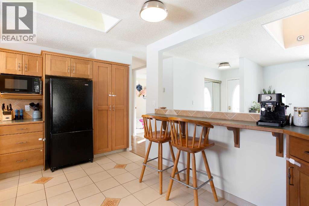 1012 Hunterston Hill Nw, Calgary, Alberta  T2K 4N8 - Photo 12 - A2290631