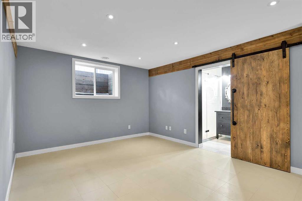 815 Woodpark Way Sw, Calgary, Alberta  T2W 2T9 - Photo 37 - A2288229