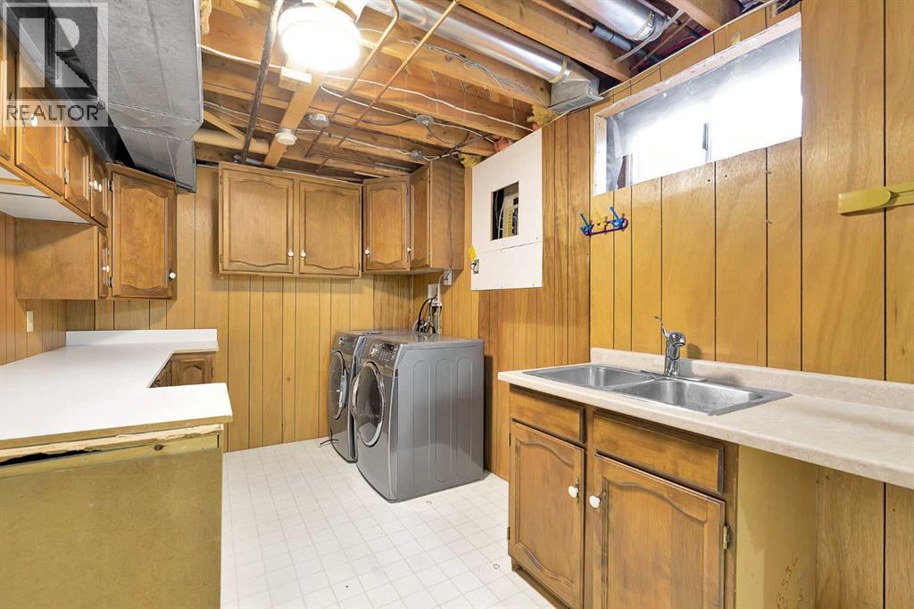 815 Woodpark Way Sw, Calgary, Alberta  T2W 2T9 - Photo 44 - A2288229