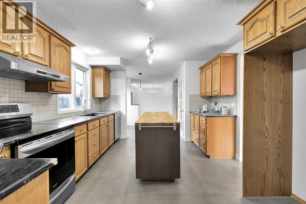 815 Woodpark Way Sw, Calgary, Alberta  T2W 2T9 - Photo 20 - A2288229