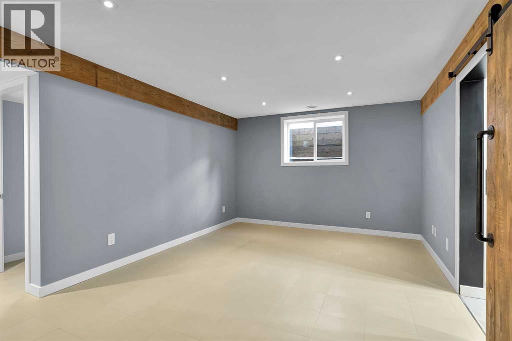 815 Woodpark Way Sw, Calgary, Alberta  T2W 2T9 - Photo 36 - A2288229