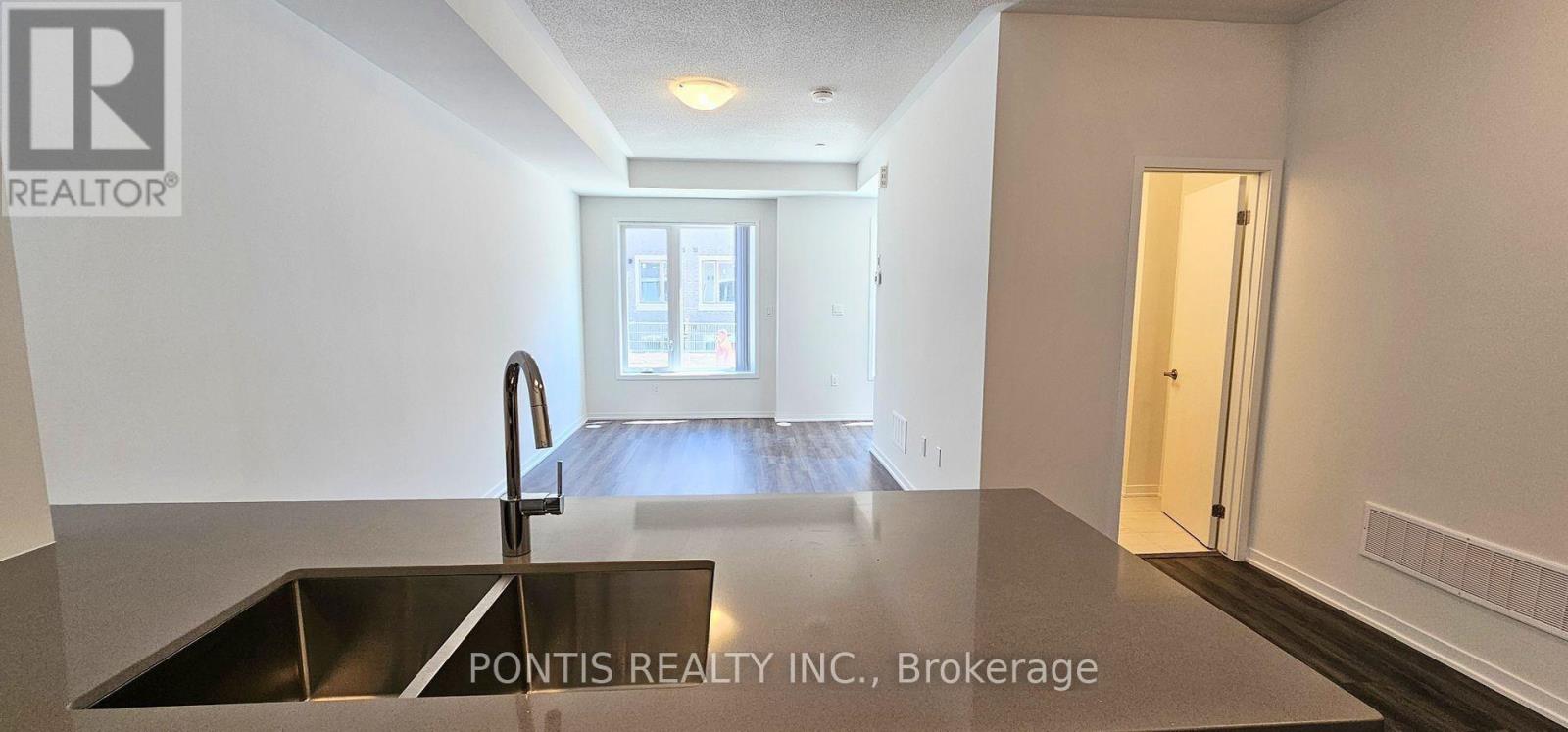 Th 200 - 141 Honeycrisp Crescent, Vaughan (Concord), Ontario  L4K 0N6 - Photo 7 - N12859116