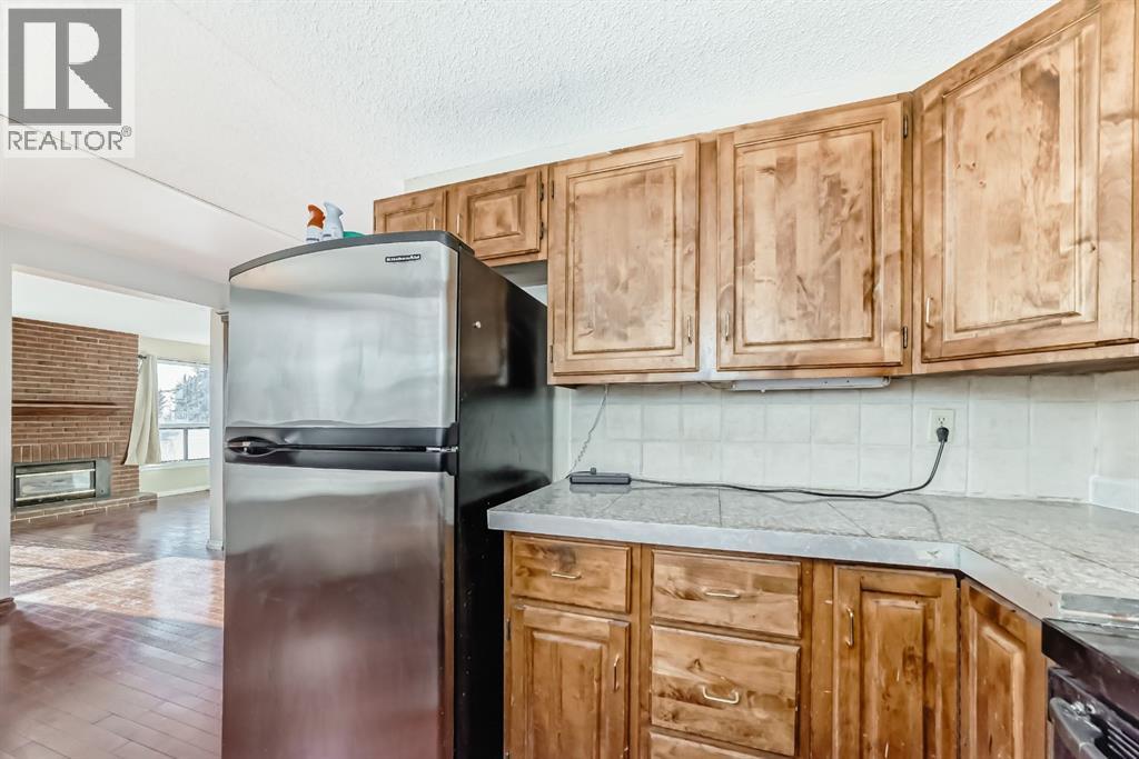 8007 Ranchview Drive Nw, Calgary, Alberta T3G 1S7 - Photo 10 - A2281459