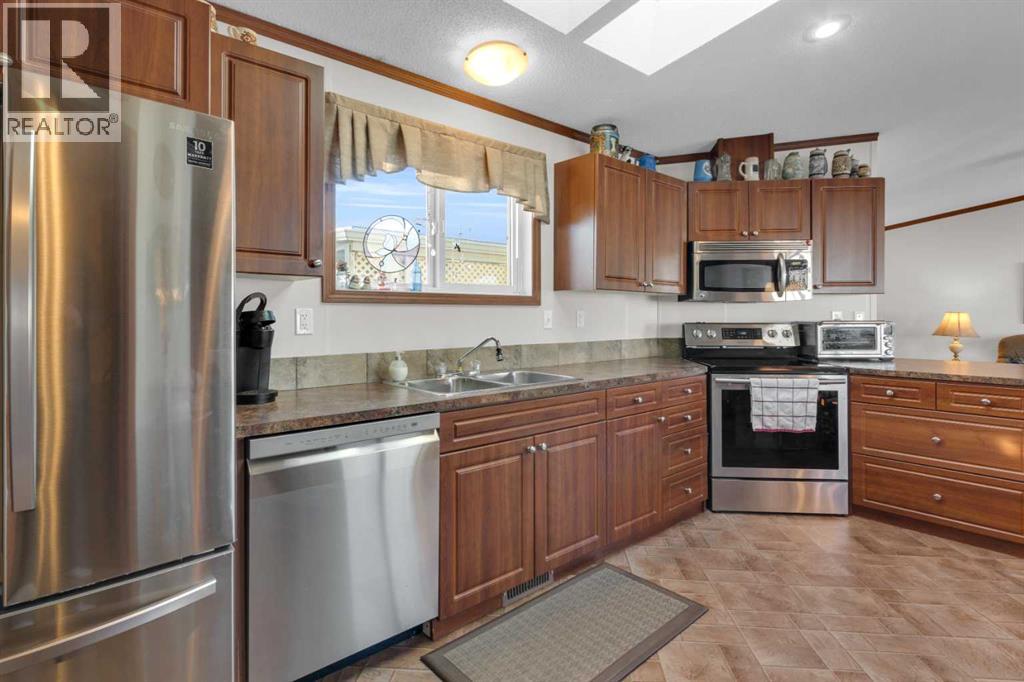 113, 99 Arbour Lake Rd Nw, Calgary, Alberta T3G 4E4 - Photo 9 - A2271864