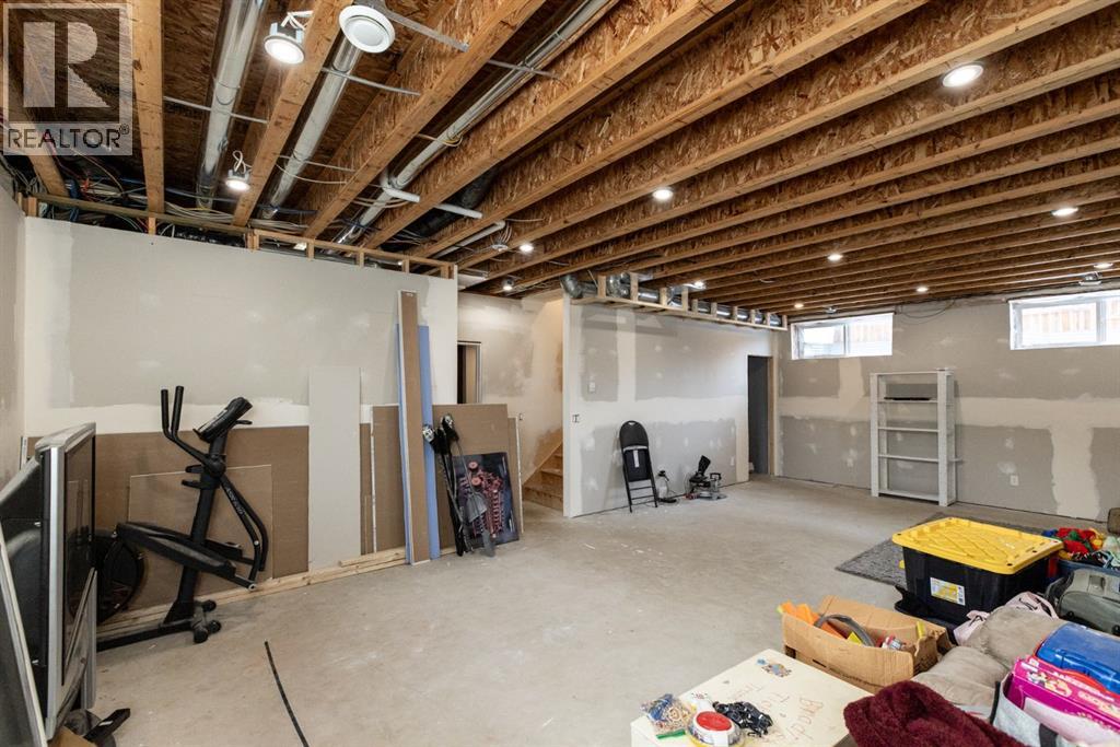 4828 55 Boulevard Close, Innisfail, Alberta T4G 0A2 - Photo 41 - A2283524