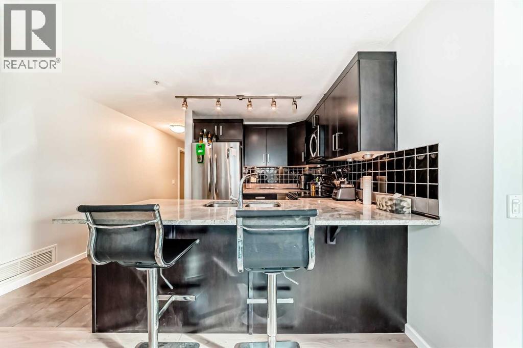 310, 1410 1 Street Se, Calgary, Alberta T2G 5T7 - Photo 8 - A2283166