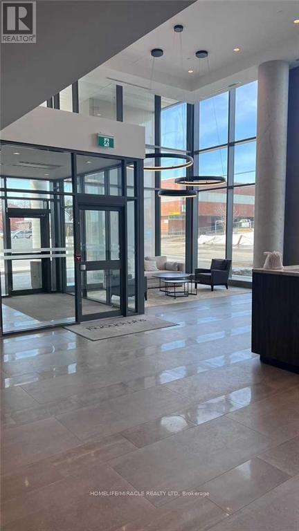 201 - 15 Lynch Street, Brampton (Queen Street Corridor), Ontario  L6W 2Z8 - Photo 1 - W12859460