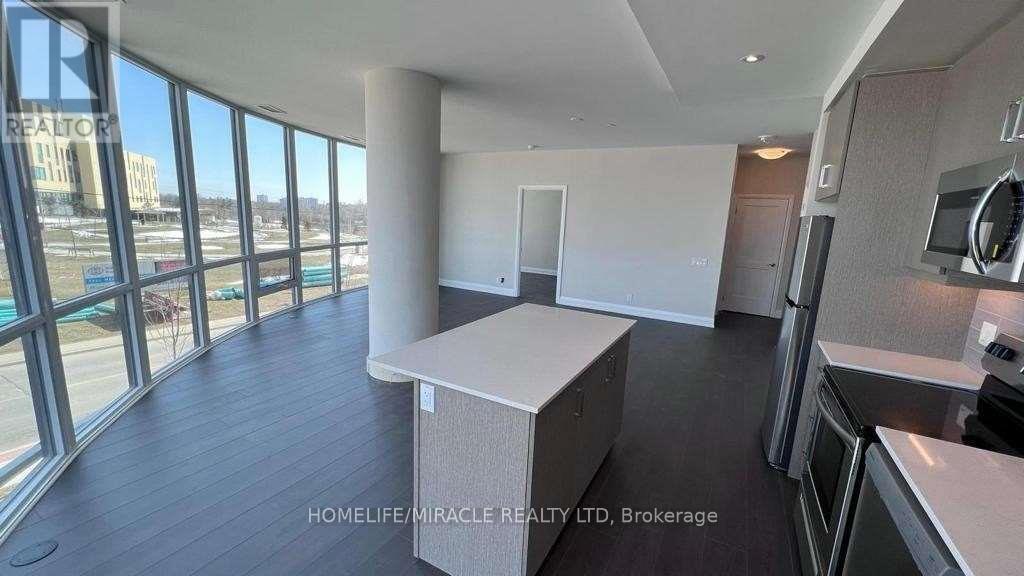 201 - 15 Lynch Street, Brampton (Queen Street Corridor), Ontario  L6W 2Z8 - Photo 4 - W12859460