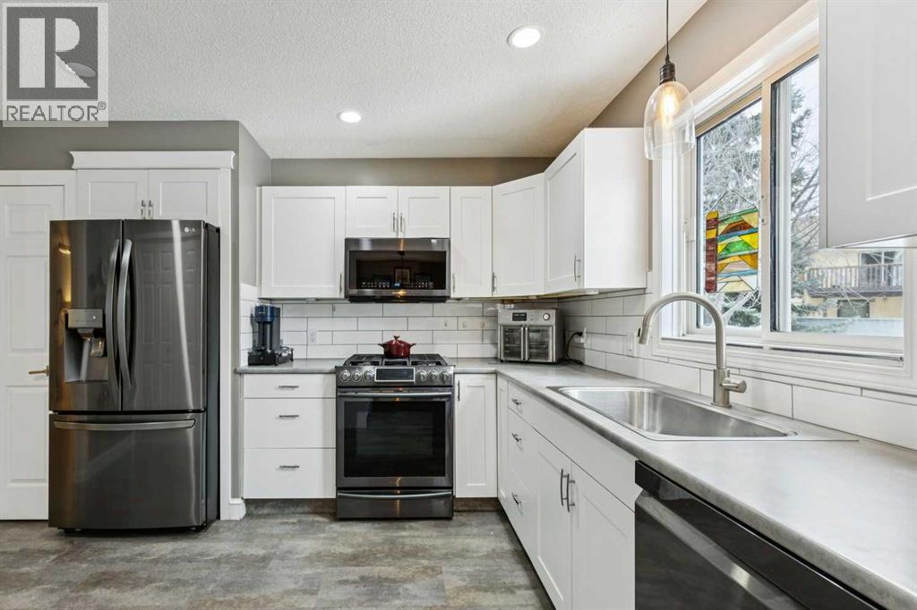 48 Deer Ridge Close Se, Calgary, Alberta T2J 7C2 - Photo 10 - A2290007